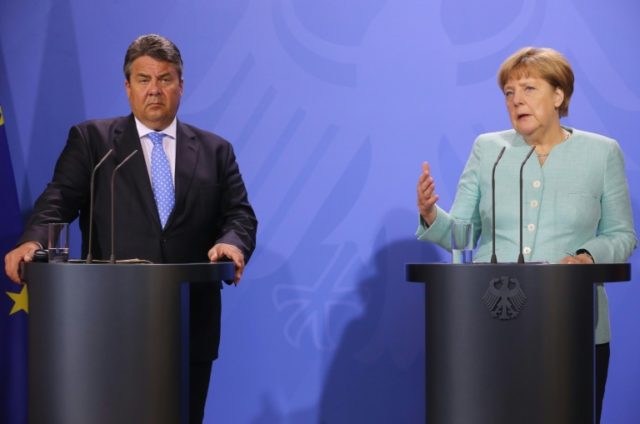 German Chancellor Angela Merkel and German Vice Chancellor, Economy and Energy Minister Si