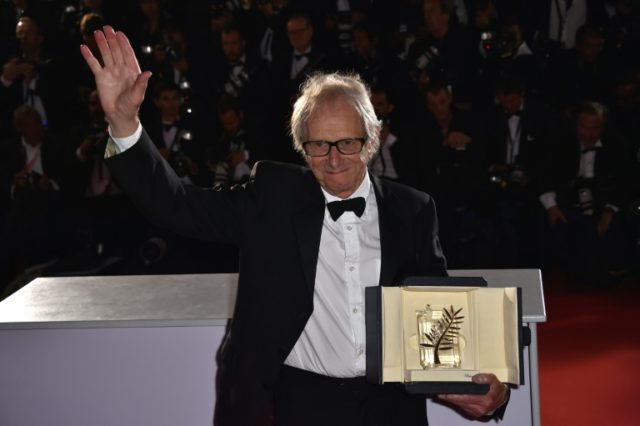 British director Ken Loach poses with his trophy on May 22, 2016 during a photocall after