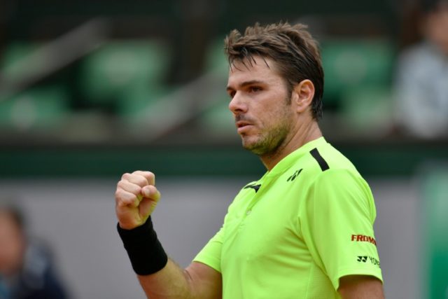 Switzerland's Stanislas Wawrinka reacts after winning a point during his fourth round matc