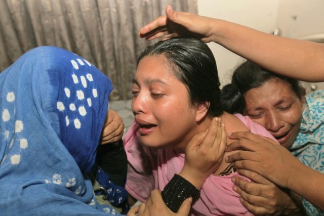 Relatives of teenager Babul Shikdar, 16, who died after allegedly being beaten by a batsma