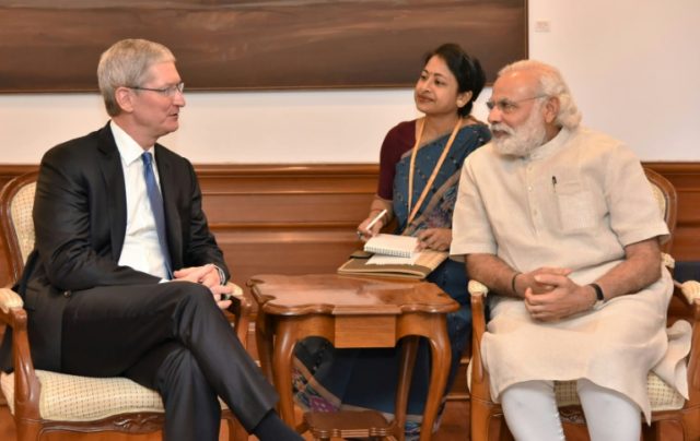 Indian Prime Minister Narendra Modi (right) meets with Apple CEO Tim Cook during a meeting