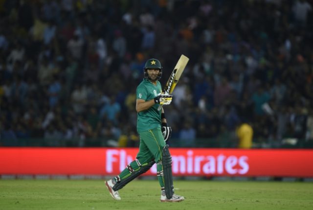 Pakistan's captain Shahid Afridi leaves after being dismissed during the World T20 cricket