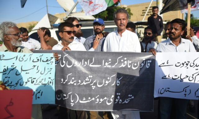 Activists from the Muttahida Quami Movement (MQM) stage a protest against the death of an