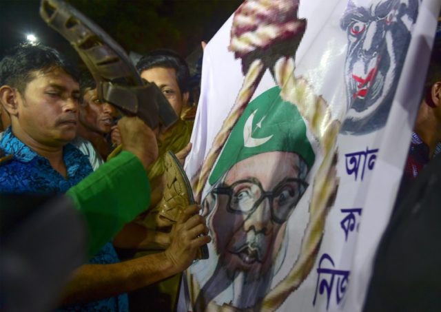 Bangladeshi activists gather outside Dhaka's Central Jail where Nizami was executed for wa