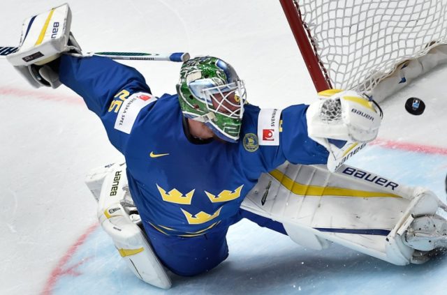 Sweden's goalie Jacob Markstrom misses the puck as it goes into his net during the quarter