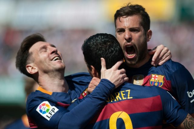 Barcelona's Luis Suarez (C), Jordi Alba (R) and Lionel Messi (L) celebrate scoring against