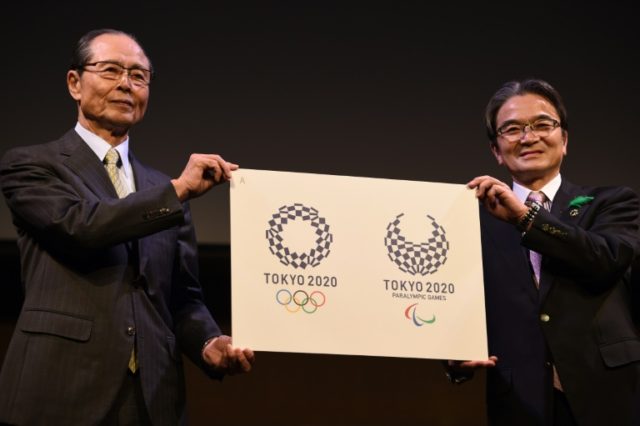 Ryohei Miyata (R), of the Tokyo 2020 Olympics logo committee, and former baseball star and