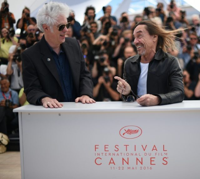 Director Jim Jarmusch (L) and singer Iggy Pop pose on May 19, 2016 during a photocall for