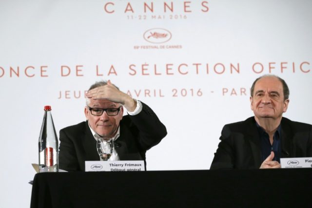 Cannes film festival general delegate Thierry Fremaux (L) and President Pierre Lescure hol