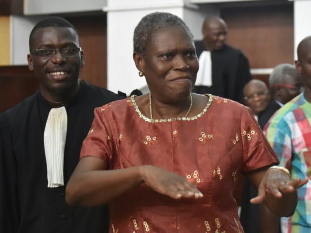 Ivory Coast's former first lady Simone Gbagbo arrives for the opening hearing of her trial
