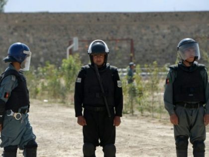 Afghan police keep watch at Pul-e-Charkhi prison, on the outskirts of Kabul, where five Af