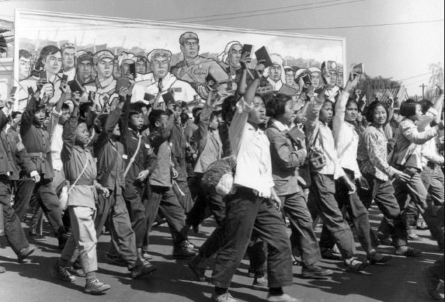 Chinese Red Guards, high school and university students, wave copies of Chairman Mao Zedon