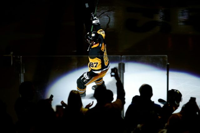 Sidney Crosby of the Pittsburgh Penguins waves to the crowd after scoring a goal in overti