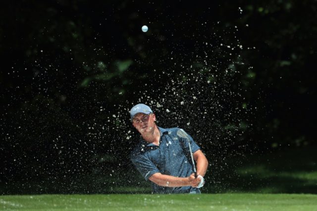 Jordan Spieth hits a shot out of the bunker on the fifth hole during the Third Round of th