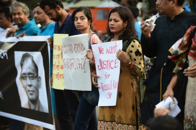 Bangladeshi demonstrators and former Rajshahi University students protest against the kill