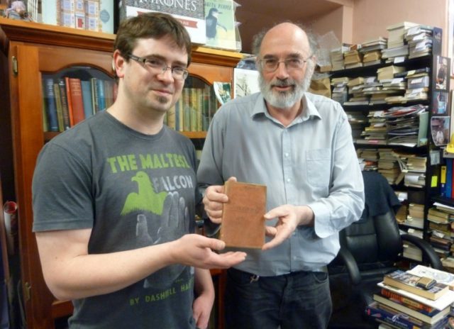 'Cracked and Spineless New and Used Books' bookshop owners Richard Sprent and Mike Gray sh
