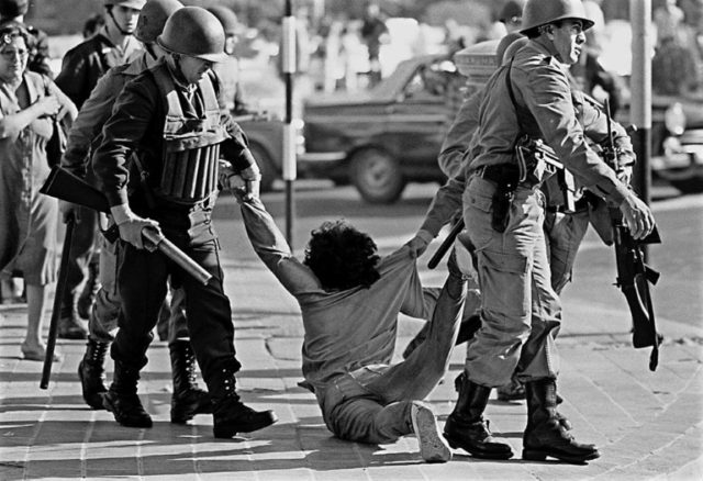 A worker being arrested during a protest against the Argentine dictatorship in Buenos Aire