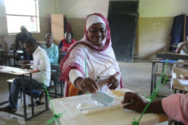 Voters cast their ballot in Mitsoudjé during the second round of Presidential elections i