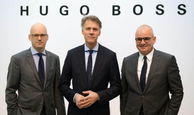 Mark Langer (L) with former CEO Claus-Dietrich Lahrs (C) and Christoph Auhagen arrive for