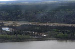 Fire threat to Alberta oil sands easing