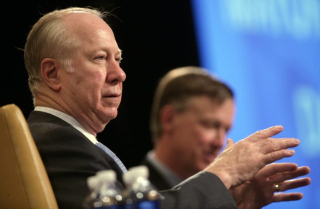 David Gergen, left, makes a point while appearing with Denver Mayor John Hickenlooper at the Denver Leadership Summit in Denver on Wednesday, May 6, 2009. (AP Photo/David Zalubowski)