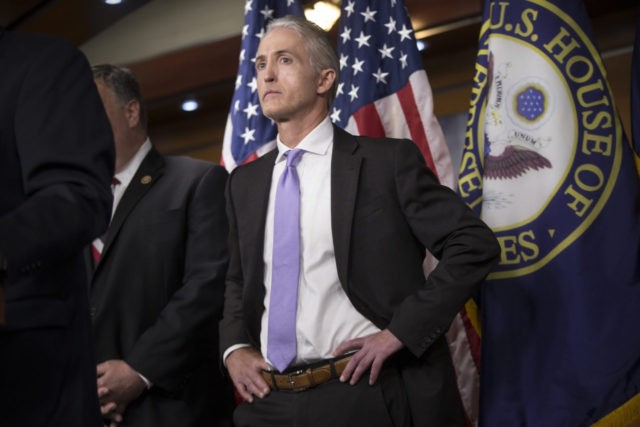 House Benghazi Committee Chairman Rep. Trey Gowdy, R-S.C., steps back as other Republican