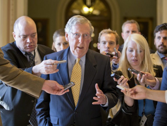 FILE -In this file July 15, 2013 file photo, Senate Republican Leader Mitch McConnell of K