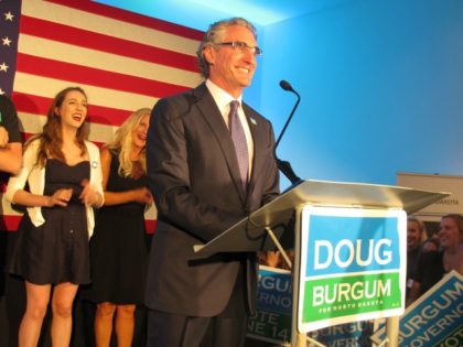 Republican governor candidate Doug Burgum talks to supporters at an art gallery in downtown Fargo, N.D., after Burgum won the GOP primary vote on Tuesday, June 14, 2016. Burgum, a Fargo businessman, defeated Attorney General Wayne Stenehjem, who was endorsed at the state Republican Party convention. (