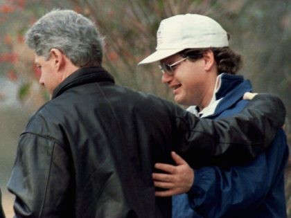 Bill and Roger Clinton (AFP / Getty)