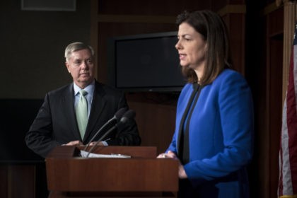 US Senator Lindsey Graham listens while Senator Kelly Ayotte speaks during a press conference on Capitol Hill March 7, 2013 in Washington, DC. The lawmakers spoke about the reported arrest of Sulaiman Abu Ghaith, the son-in-law of Osama Bin Laden, who was taken into custody in the Middle East and …