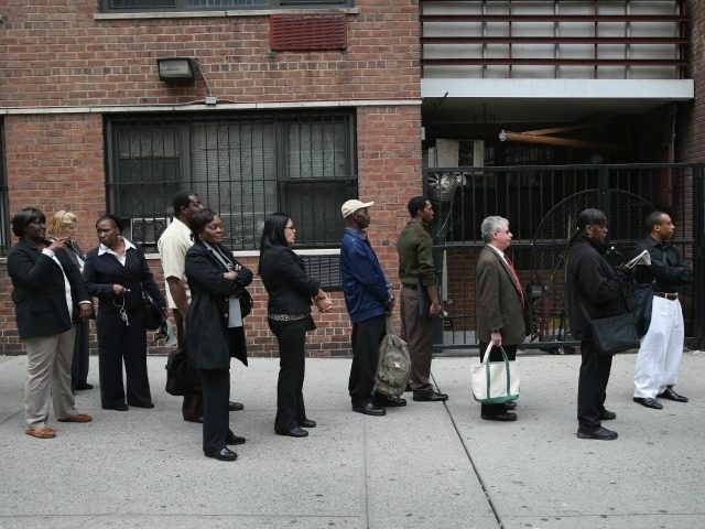 Hundreds of people line up to attend a job fair on April 18, 2013 at the Holiday Inn in Midtown in New York City. The event was held by National Career Fairs which expected some 700 job seekers would come to meet 20 potential employers. (Photo by
