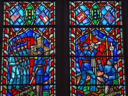 This stained glass window on June 25, 2015, at The Washington National Cathedral in Washington, DC, depicts the life of US Civil War General Robert E. Lee, Commander of the Army of Northern Virginia. The dean of The National Cathedral, Reverend Gary Hall, called on June 25 for two stained …