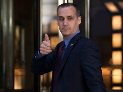 Corey Lewandowski, campaign manager for Donald Trump, gives the thumbs up as he leaves the Four Seasons Hotel after a meeting with Trump and Republican donors, June 9, 2016 in New York.