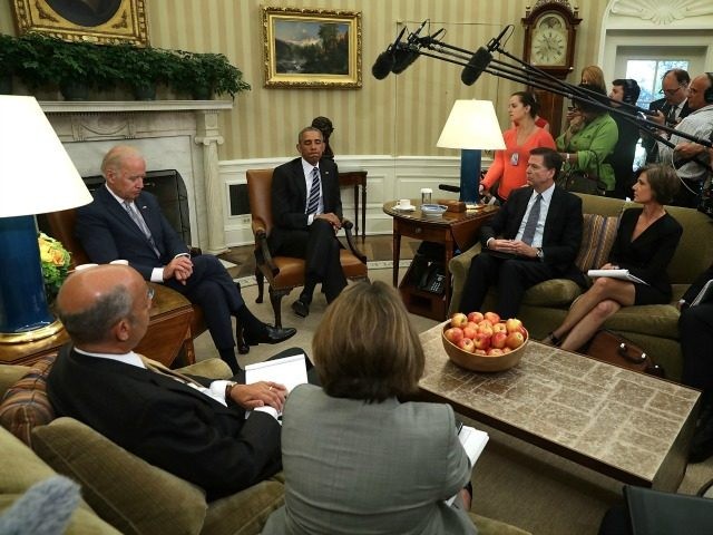 President Barack Obama and Vice President Joseph Biden meet with FBI Director James Comey (3rd R), Homeland Security Secretary Jeh Johnson (L), Director of the National Counterterrorism Center (NCTC) Nicholas Rasmussen (R), and Deputy Attorney General Sally Yates (2nd R) in the Oval Office of the White House June 13, …