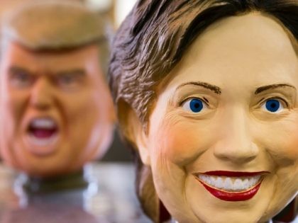 Rubber masks in the likeness of Republican presidential candidate Donald Trump, left, and