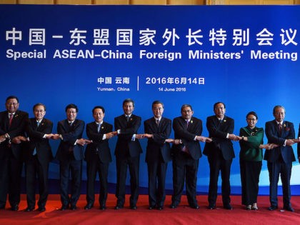 Chinese Foreign Minister Wang Yi (6th R) and foreign ministers from ASEAN-member nations p
