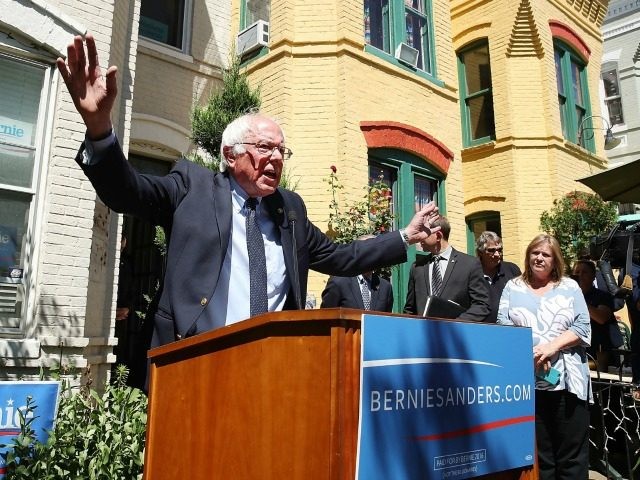 Democratic Presidential Candidate Bernie Sanders speaks to the media outside of his campai