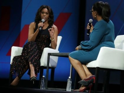 Michelle Obama (L) and Oprah Winfrey (R) participate in a conversation on 'Trailblazi