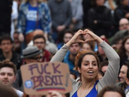 LONDON, ENGLAND - JUNE 28: (EDITORS NOTE: Image contains profanity.) Protesters gather ag