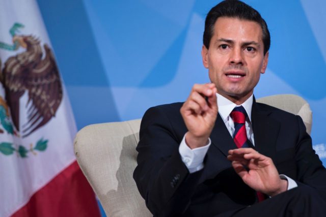 Mexican President Enrique Pena Nieto makes a statement to the press after a meeting with U