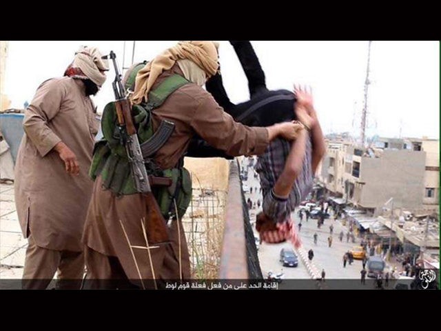ISIS militants executing a gay man in Fallujah by throwing him off a building.