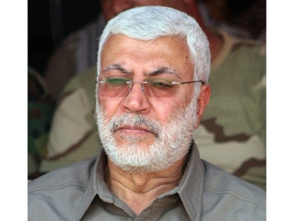 Mehdi Mohandes, deputy commander of the Popular Mobilisation forces, attends a ceremony on August 31, 2015, to commemorate the first anniversary of the retaking of the Salaheddin province town of Amerli from the Islamic State group (IS) jihadists. IS had overran large parts of Iraq last year and still controls …