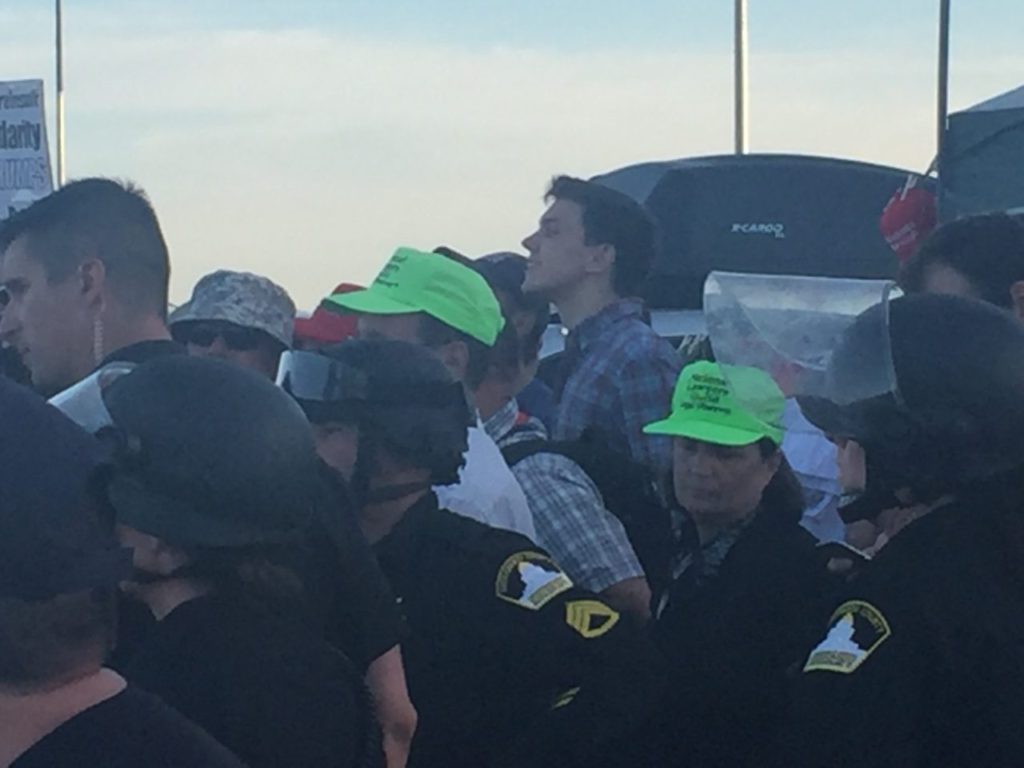 More national lawyers guild legal observers in the green hats (Michelle Moons / Breitbart News)