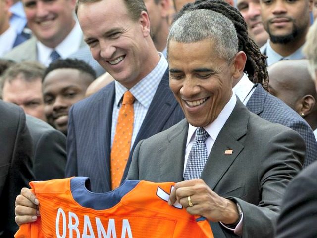 Obama and Peyton Manning AP
