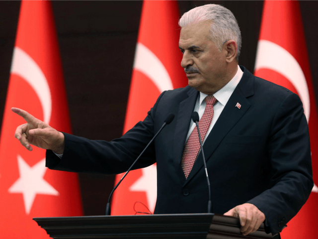 Turkish Prime Minister Binali Yildirim gestures as he delivers a speech during a press conference after a Turkish-Israeli meeting, at the Cankaya Palace in Ankara, on June 27, 2016.