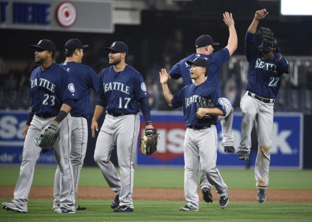 SAN DIEGO, CALIFORNIA - JUNE 2: Seattle Mariners celebrate after beating the San Diego Pad
