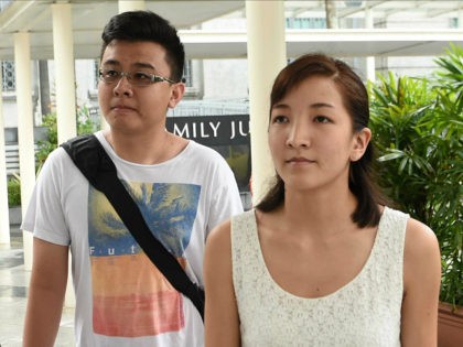 Australian Japanese Ai Takagi (R), 23, and her Singaporean husband Yang Kaiheng (L), 27, a