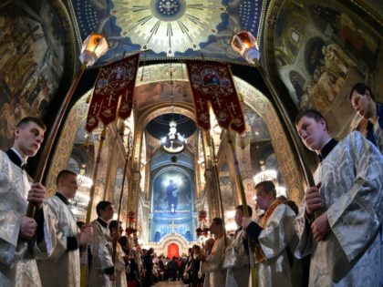 Christians Orthodox worshippers attend anOrthodox Easter ceremony at the Volodymyrsky Cath