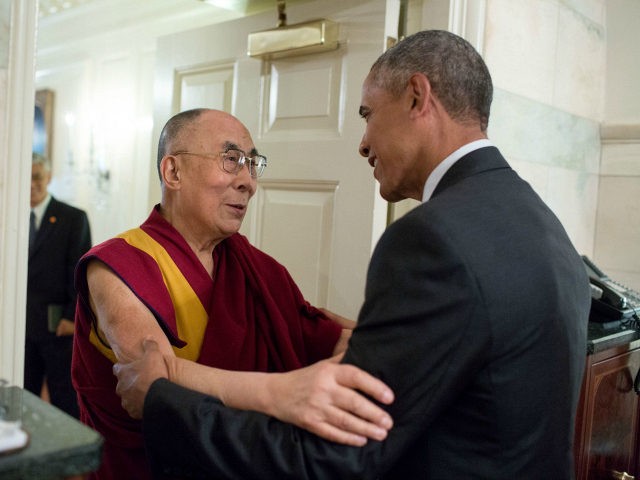 President Barack Obama greets His Holiness the Dalai Lama at the entrance of the Map Room
