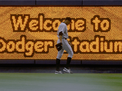 A sign welcomes fans to Dodger Stadium as the Los Angeles Dodgers host the Houston Astros on August 26, 2005 at Dodger Stadium in Los Angeles, California. The Astros went on to win 2-1. (Photo by Stephen Dunn /Getty Images)